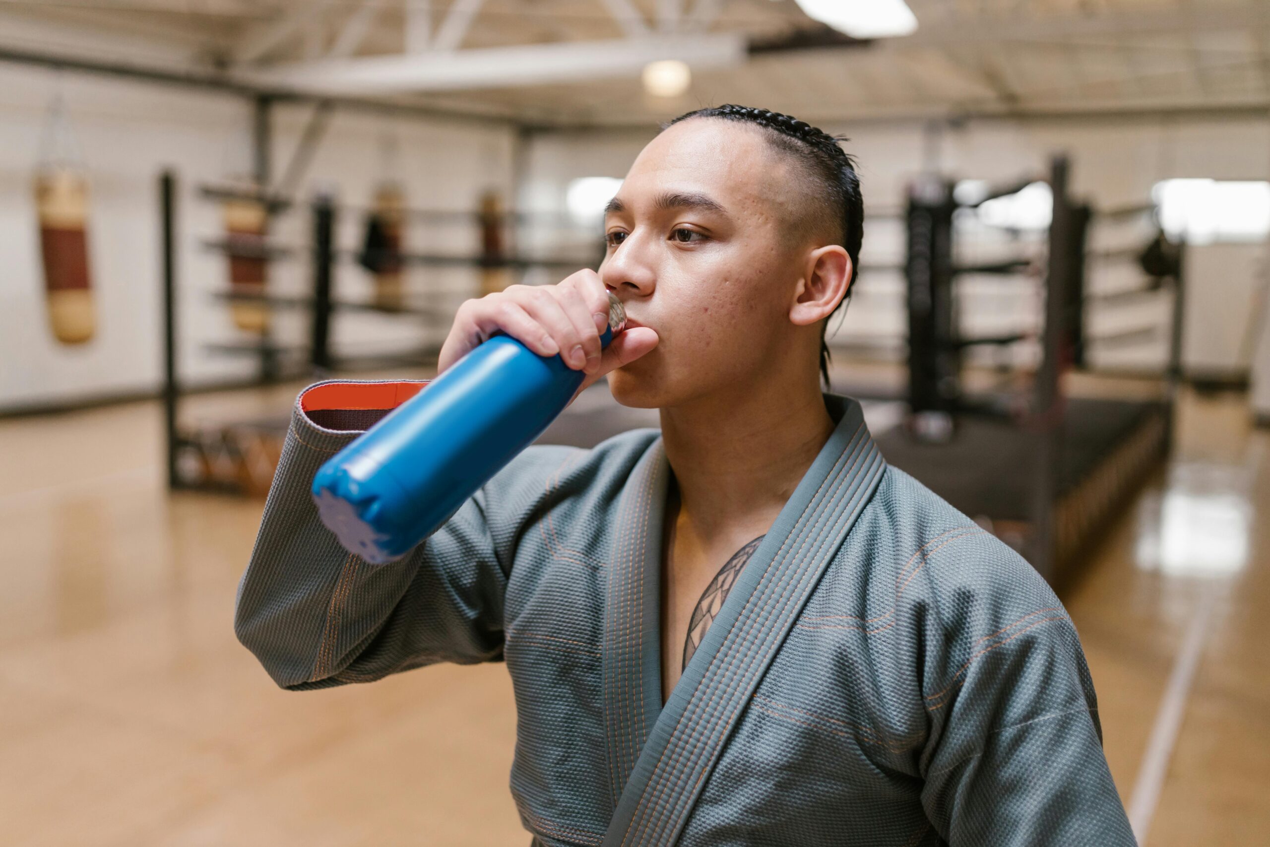 Man Drinking from A Gym Bottle